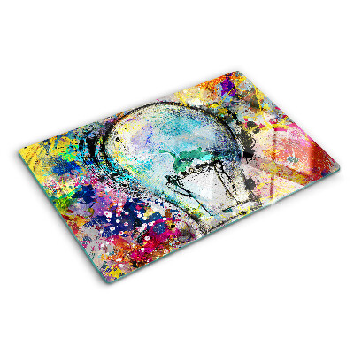 Szklana deska do krojenia z nadrukiem przedstawiającym żarówkę na kolorowym tle