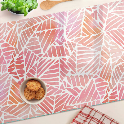 Deska kuchenna szklana z motywem liści w pastelowych odcieniach