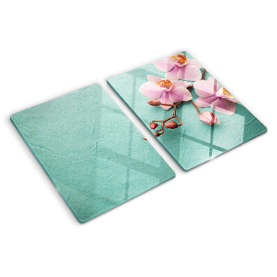 Szklana deska kuchenna z motywem orchidei na niebieskim tle