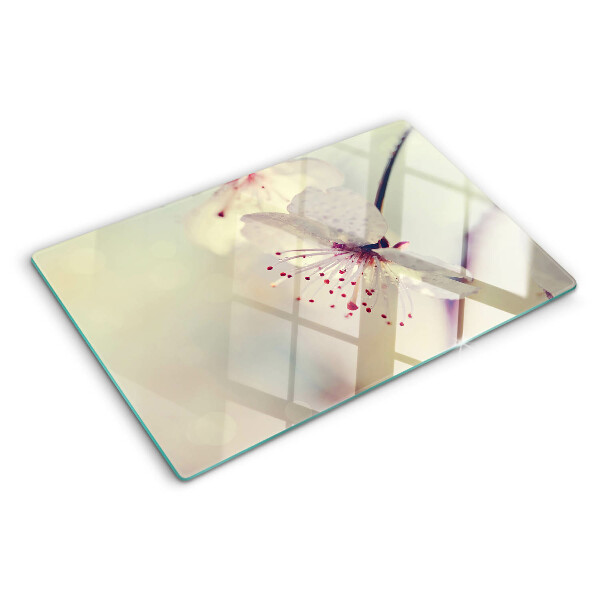 Szklana deska kuchenna z motywem kwiatowym na tle geometrycznym