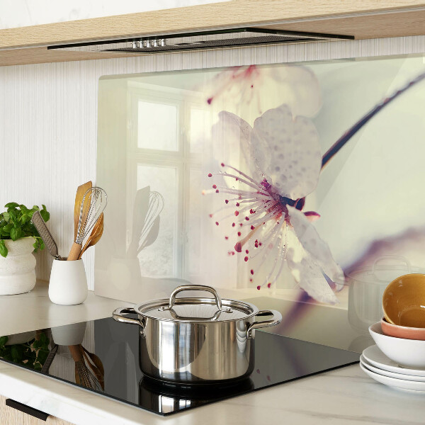 Szklana deska kuchenna z motywem kwiatowym na tle geometrycznym