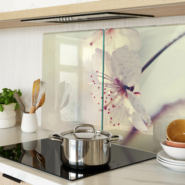 Szklana deska kuchenna z motywem kwiatowym na tle geometrycznym