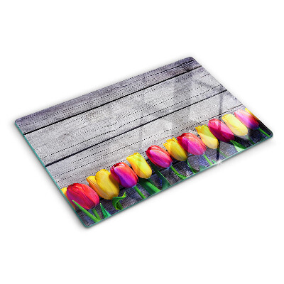 Deska kuchenna szklana z motywem tulipanów na tle drewnianym