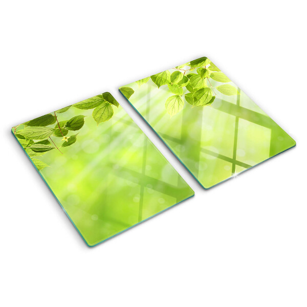 Szklana deska do krojenia z motywem zielonych liści na jasnym tle