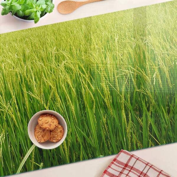 Szklana deska kuchenna z motywem zielonego pola trawy