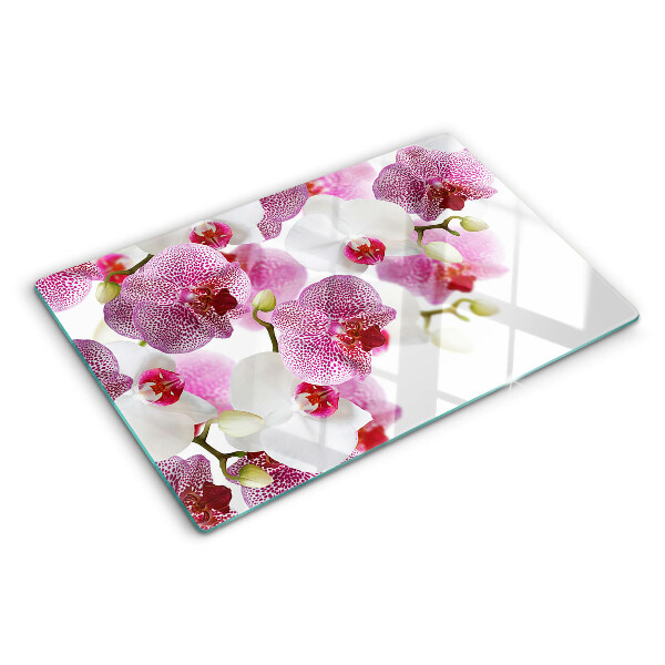 Szklana deska do krojenia z motywem orchidei na tle okna