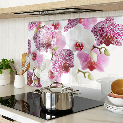 Szklana deska do krojenia z motywem orchidei na tle okna