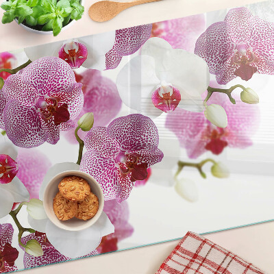 Szklana deska do krojenia Orchidee na tle okna