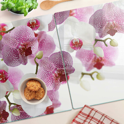 Szklana deska do krojenia Orchidee na tle okna