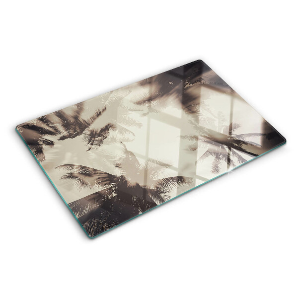 Szklana deska kuchenna z motywem palm na tle monochromatycznym