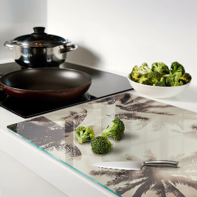 Szklana deska kuchenna z motywem palm na tle monochromatycznym