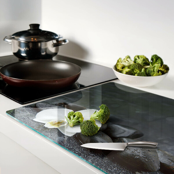 Szklana deska do krojenia z motywem kwiatu orchidei na kamieniach