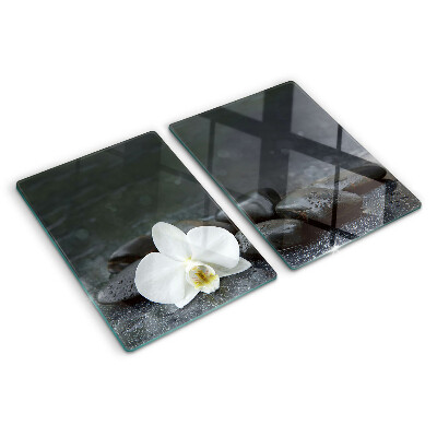 Szklana deska do krojenia z motywem kwiatu orchidei na kamieniach