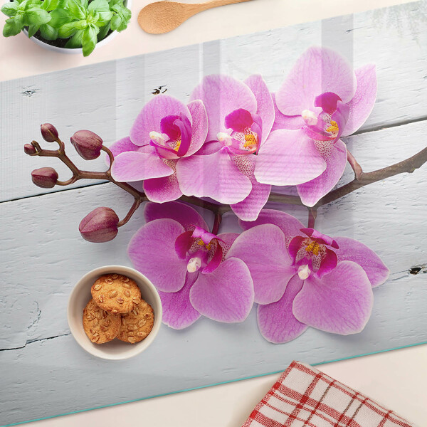 Szklana deska do krojenia Orchidee na białym tle