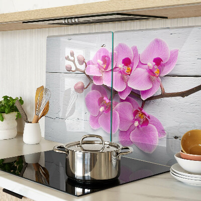 Szklana deska do krojenia z motywem orchidei na białym tle