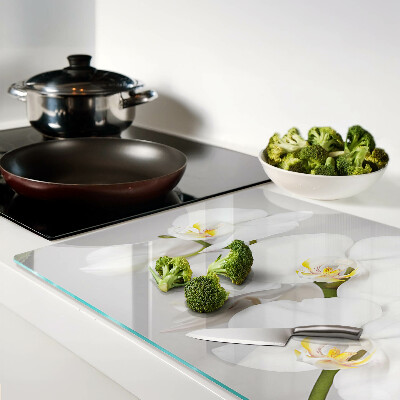 Deska kuchenna szklana z motywem orchidei na tle lustrzanym