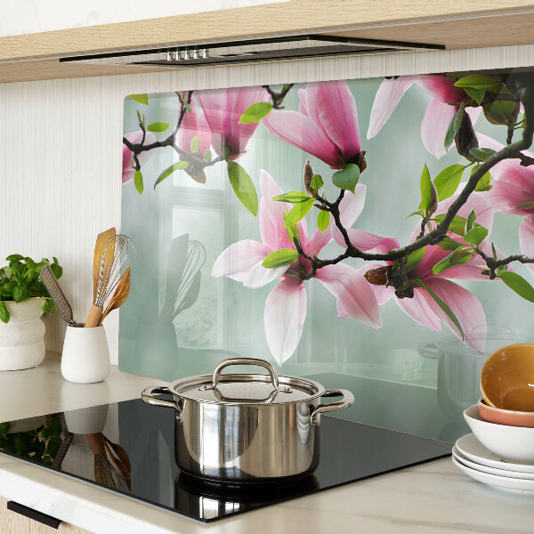 Szklana deska do krojenia z motywem kwiatów magnolii na zielonym tle