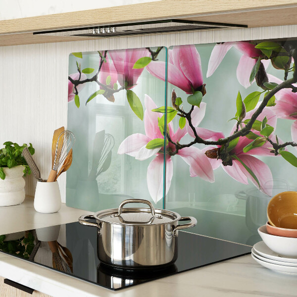 Szklana deska do krojenia z motywem kwiatów magnolii na zielonym tle