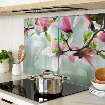 Szklana deska do krojenia z motywem kwiatów magnolii na zielonym tle