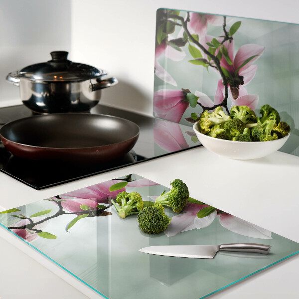 Szklana deska do krojenia z motywem kwiatów magnolii na zielonym tle