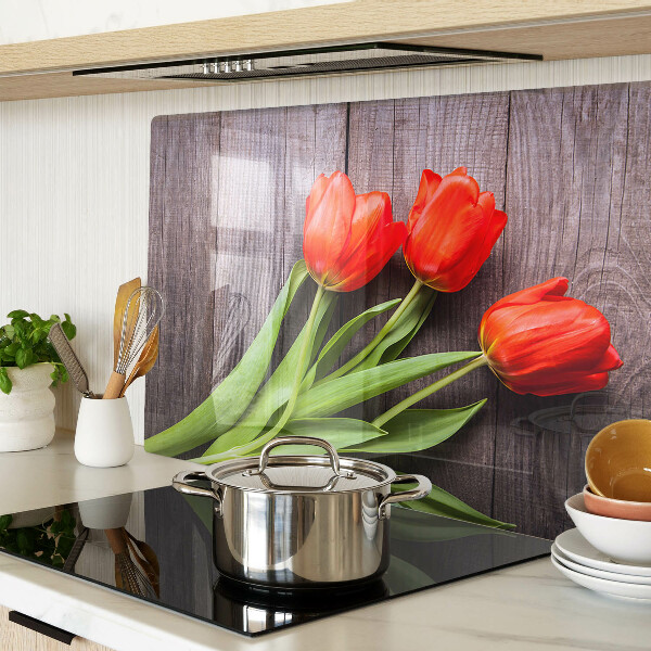 Szklana deska kuchenna z motywem tulipanów na tle przypominającym drewno