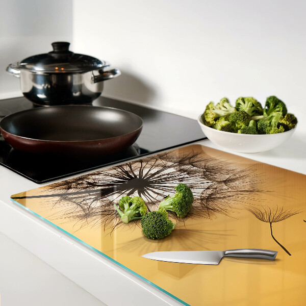 Deska kuchenna szklana z motywem dmuchawców na tle zachodu słońca