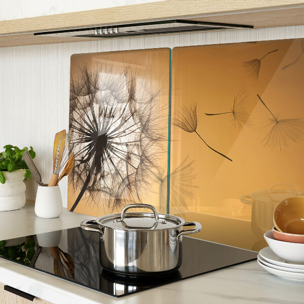 Deska kuchenna szklana z motywem dmuchawców na tle zachodu słońca