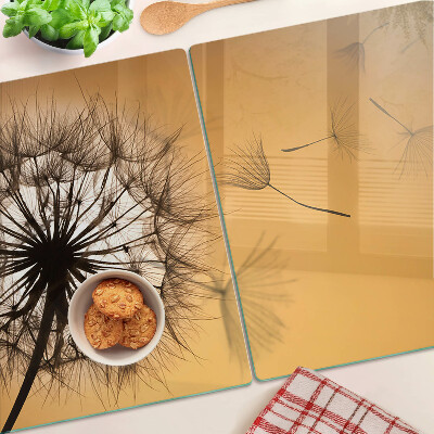 Deska kuchenna szklana z motywem dmuchawców na tle zachodu słońca