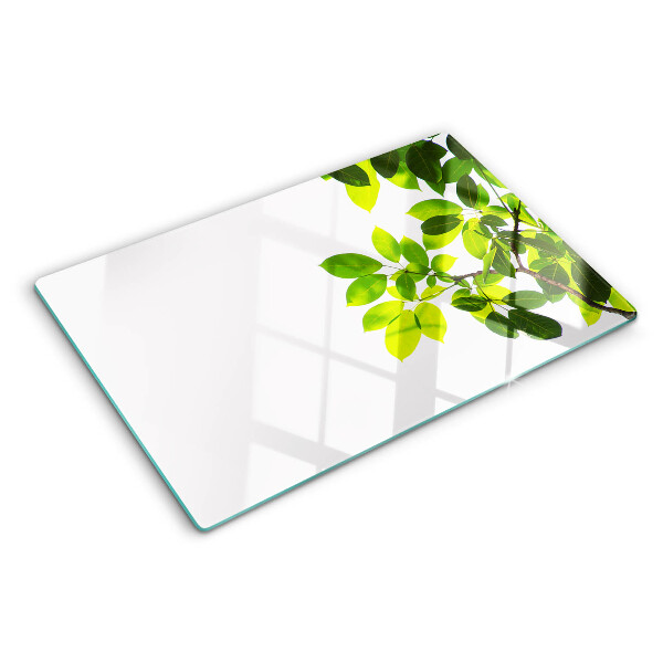 Szklana deska do krojenia z motywem liści na jasnym tle