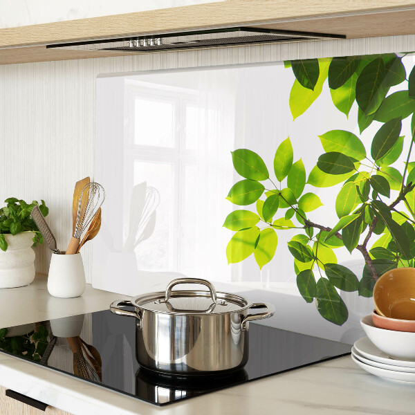 Szklana deska do krojenia z motywem liści na jasnym tle