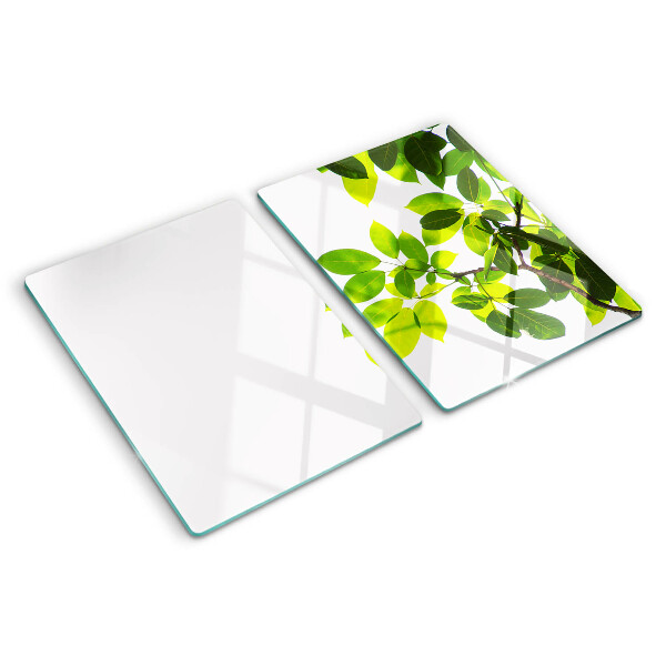 Szklana deska do krojenia z motywem liści na jasnym tle
