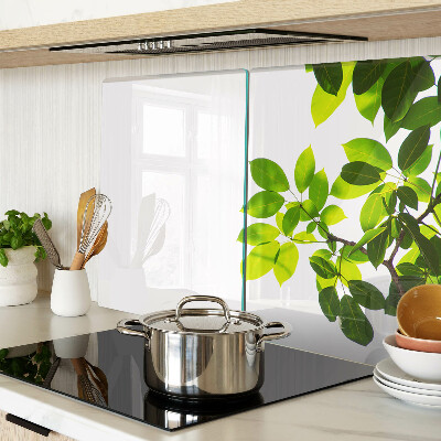 Szklana deska do krojenia z motywem liści na jasnym tle