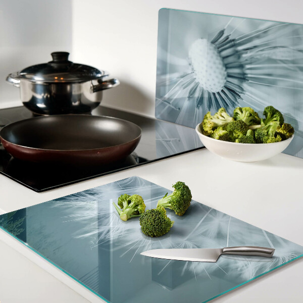 Szklana deska do krojenia z nadrukiem dmuchawców na tle nieba