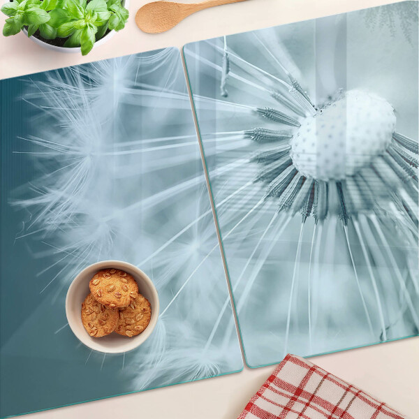 Szklana deska do krojenia z nadrukiem dmuchawców na tle nieba