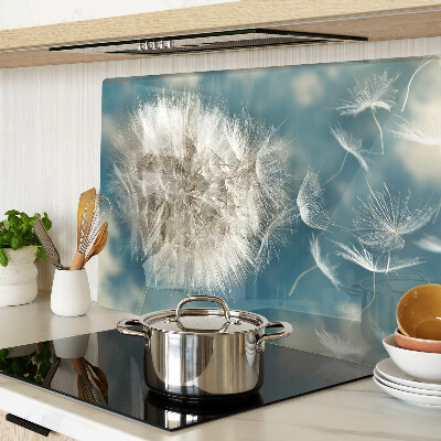Szklana deska kuchenna z nadrukiem dmuchawców na tle błękitnego nieba