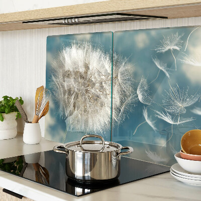 Szklana deska kuchenna z nadrukiem dmuchawców na tle błękitnego nieba