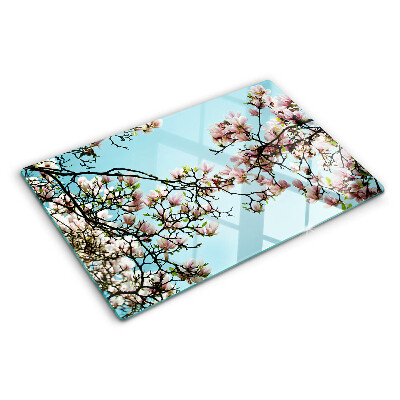 Deska kuchenna szklana z motywem kwiatów magnolii na niebieskim tle