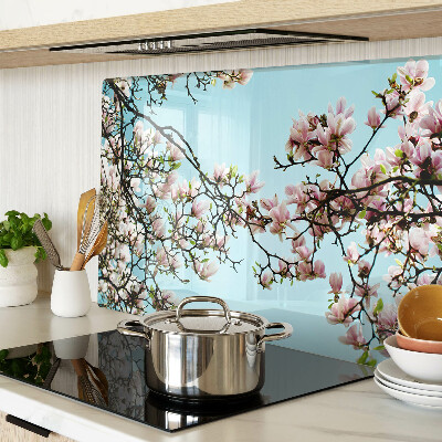 Deska kuchenna szklana z motywem kwiatów magnolii na niebieskim tle