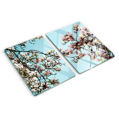 Deska kuchenna szklana z motywem kwiatów magnolii na niebieskim tle