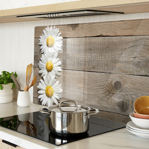 Szklana deska do krojenia z motywem kwiatów na tle drewna