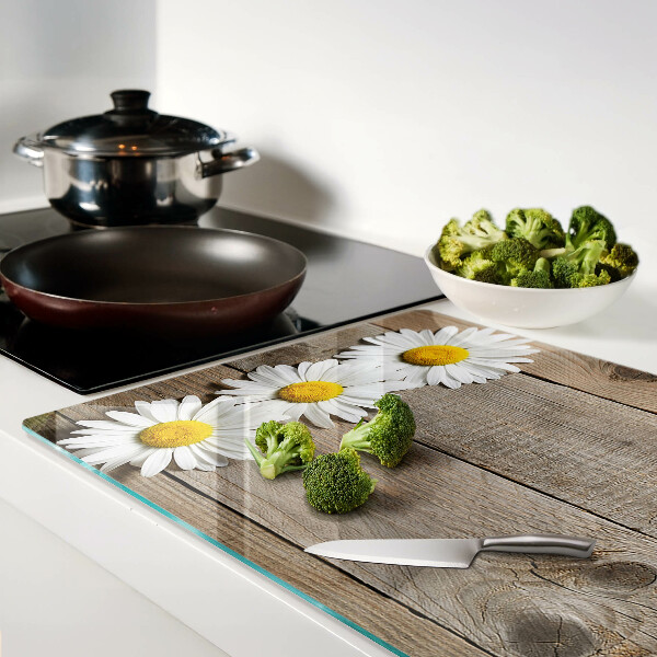 Szklana deska do krojenia z motywem kwiatów na tle drewna