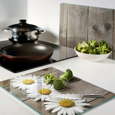 Szklana deska do krojenia z motywem kwiatów na tle drewna