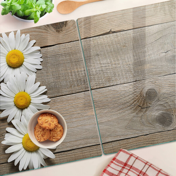 Szklana deska do krojenia z motywem kwiatów na tle drewna