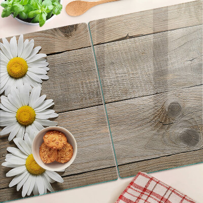 Szklana deska do krojenia z motywem kwiatów na tle drewna