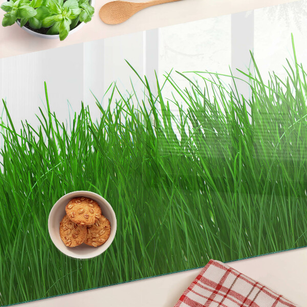 Szklana deska kuchenna z nadrukiem przedstawiającym trawę w słońcu