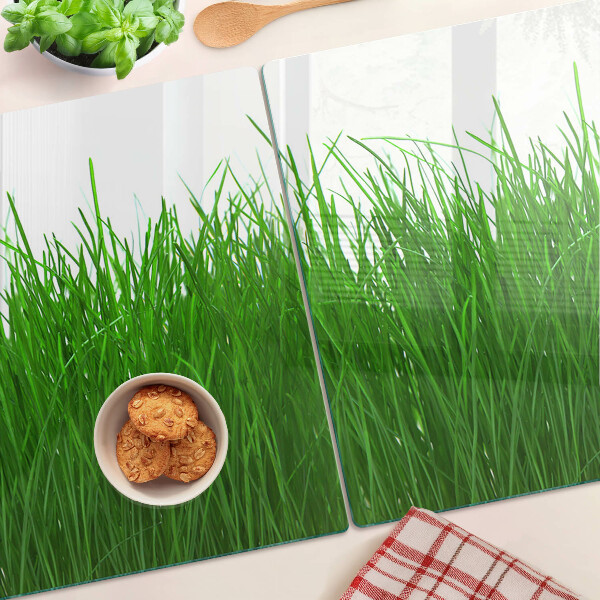 Szklana deska kuchenna z nadrukiem przedstawiającym trawę w słońcu
