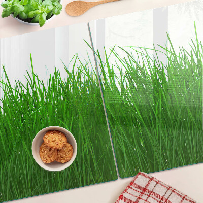 Szklana deska kuchenna z nadrukiem przedstawiającym trawę w słońcu