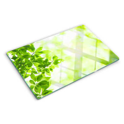 Szklana deska do krojenia z motywem zielonych liści o jasnym podświetleniu