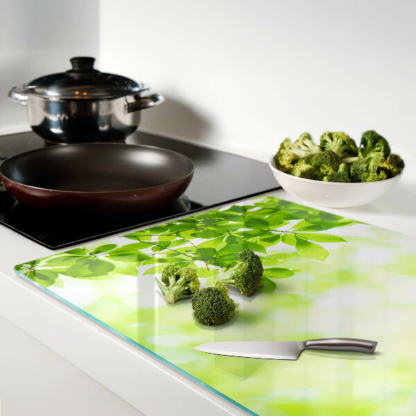 Szklana deska do krojenia z motywem zielonych liści o jasnym podświetleniu