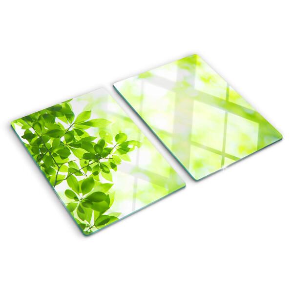 Szklana deska do krojenia z motywem zielonych liści o jasnym podświetleniu